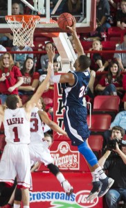  Senior forward Jordan McCoy finishes strong at the basket. Photo by Western Kentucky University Media Relations.