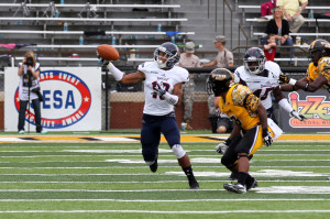 FAU cornerback Christian Milstead grabs the ball for his first interception during Saturday afternoon's game. Milstead ran the interception 61 yards for a touchdown. Photo courtesy of Josh Fryd.