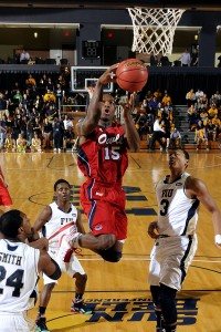 Guard Richard Morrow going up to lay in his only basket of the game. Photo by Alex Hernandez.