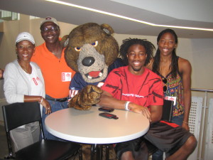 Danielle Aromashodu (far right) posing next to her brother, Devin. Her parents, Dorothy and Inkey, are seen on the left. Photo courtesy of Danielle Aromashodu.