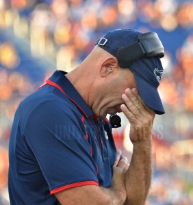FAU head coach Carl Pelini was visibly upset following the last-second 24-23 loss to Marshall at FAU Stadium on Saturday. Photo by Ryan Murphy.