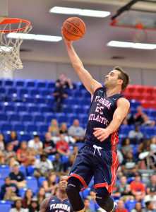 Owls guard Pablo Bertone scores early in the first half of Friday night’s 86-51 win over Ave Maria University. Photo by Ryan Murphy. 