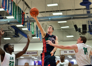 Guard Jackson Trapp attempts a layup in the first half. Trapp led the Owls Friday night with 23 points. Photo by Ryan Murphy.