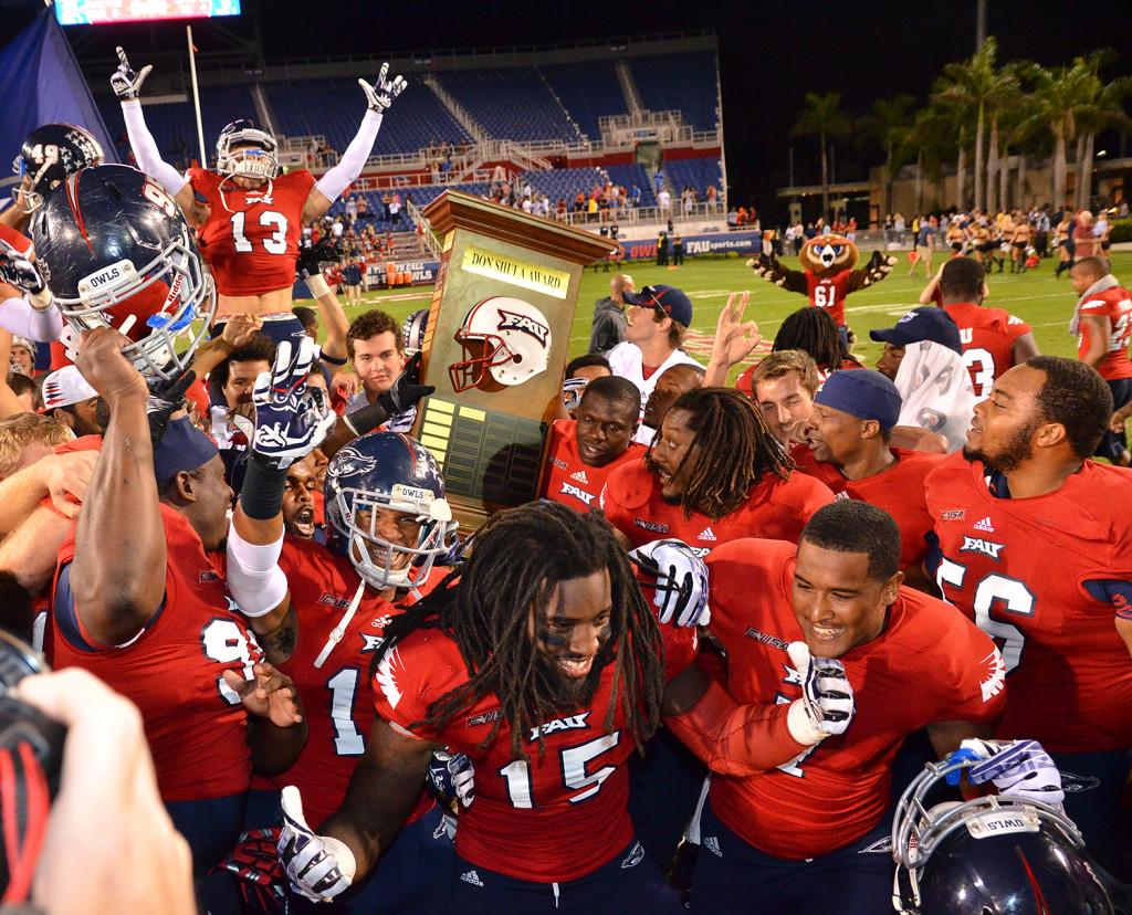 The Owls celebrate their fourth straight victory against FIU. Photo by Ryan Murphy