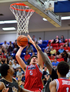 Javier Lacunza tries to finish through contact during a Dec. 3 game versus UCF. Photo by Ryan Murphy