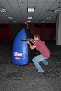 Nick Voils, senior exercise science major takes cover while firing on an enemy. Photo courtesy of Austen Erblat.