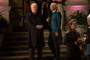 Plutarch Heavensbee (Philip Seymour Hoffman, left) and Haymitch Abernathy (Woody Harrelson, right) in The Hunger Games: Catching Fire. Photo by Murray Close/Lionsgate